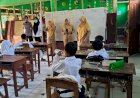 Senyum-Ceria-Pelajar-Sambut-Makan-Bergizi-Gratis-dari-Polres-Ngawi
