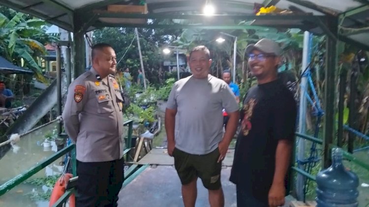 Curah-Hujan-Tinggi,-Polisi-Bersama-Perangkat-Desa-Cek-Debit-Air-Sungai-dan-Aktivitas-Transportasi-Tambang